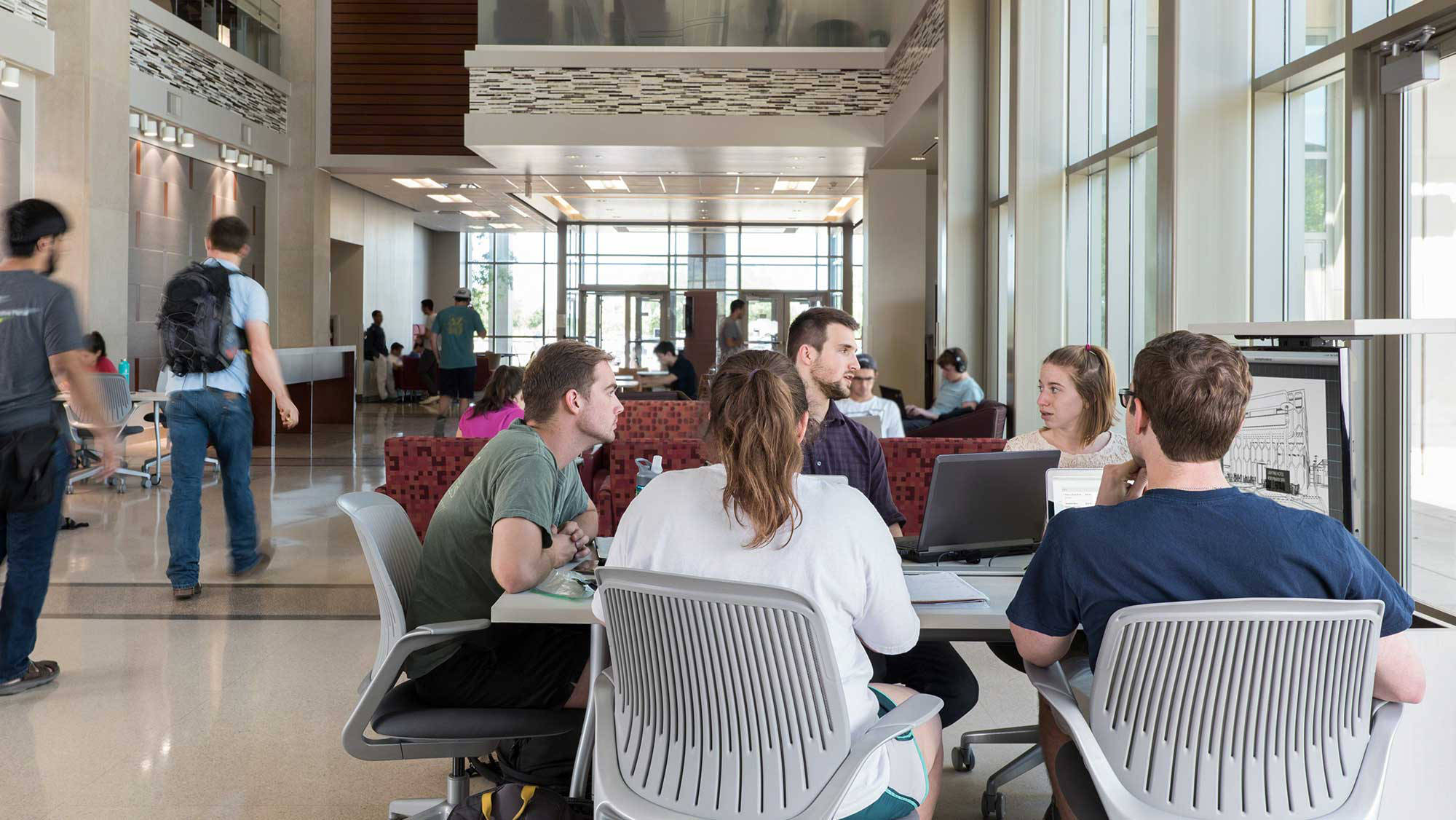 student study groups gathering in the atrium of an engineering building